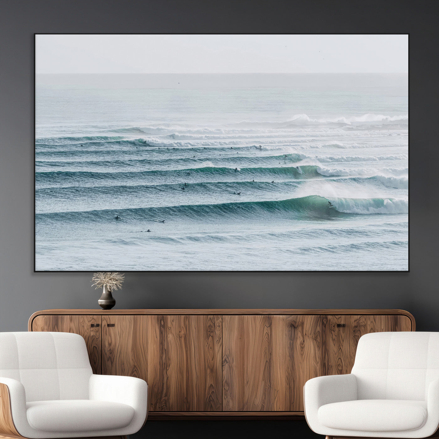 High-angle view of surfers lining up across layered ocean waves, ideal for minimal coastal or surf-inspired room decor.