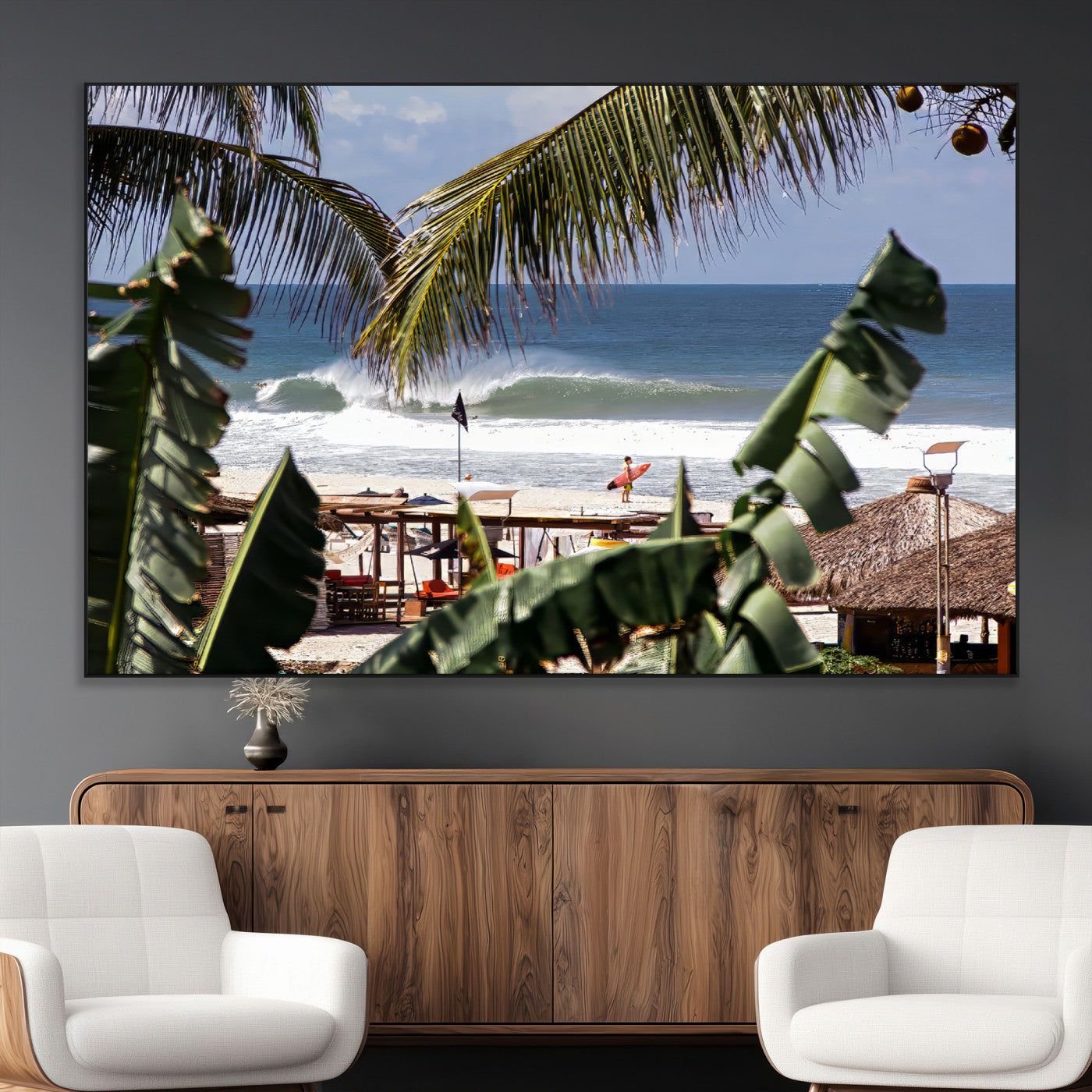 Canvas wall art of a tropical surf scene framed by palm trees, with a surfer on the shore and waves rolling in, ideal for beach-themed decor.
