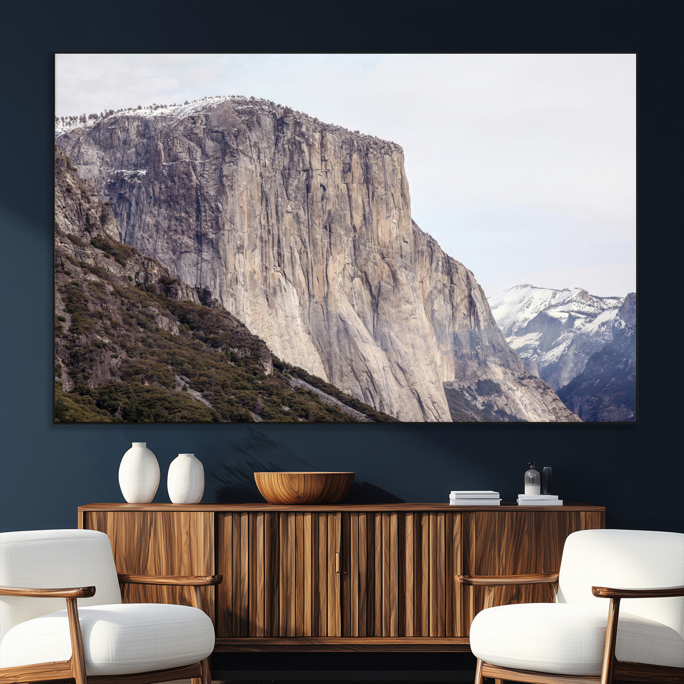 Framed canvas of El Capitan’s vertical granite face in Yosemite with snowy peaks, ideal for Sierra minimalism or mountain-inspired decor.