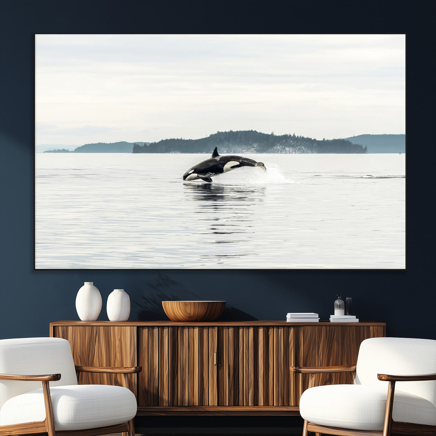 An orca jumping out of calm ocean waters with a misty island in the background, creating a serene and minimalist marine wildlife scene.
