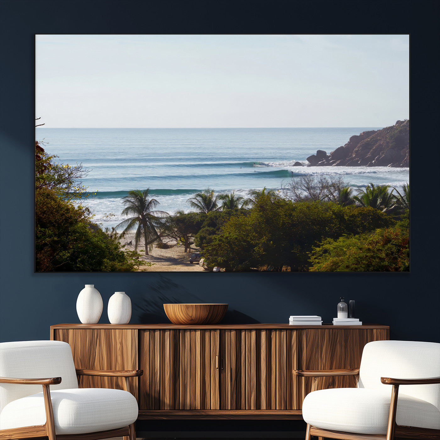 View of calm ocean waves with palm trees and a tropical coastline, ideal for coastal boho or beach-themed wall decor.