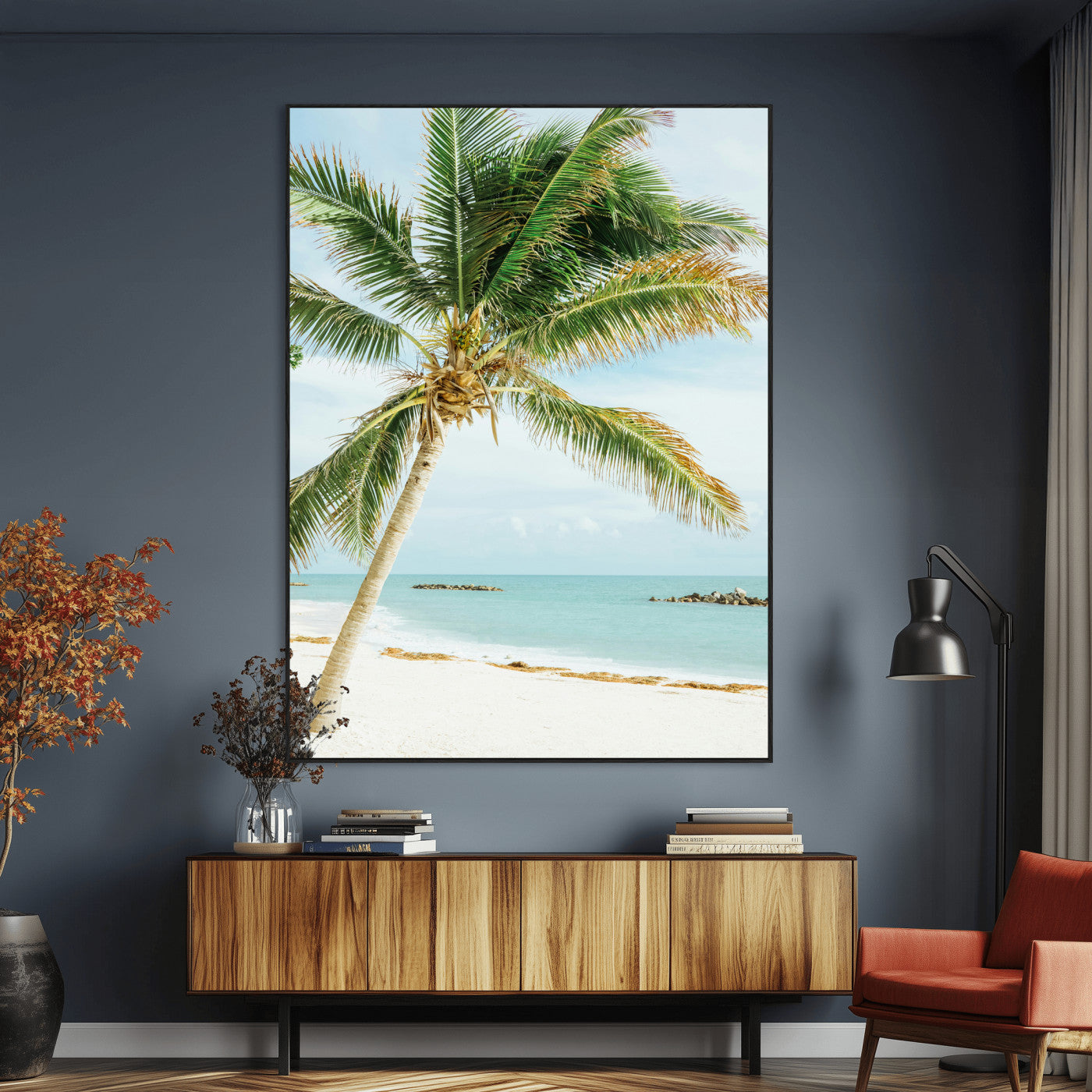 A tall palm tree leaning over a white sandy beach with turquoise ocean waves, creating a peaceful and tropical coastal scene.