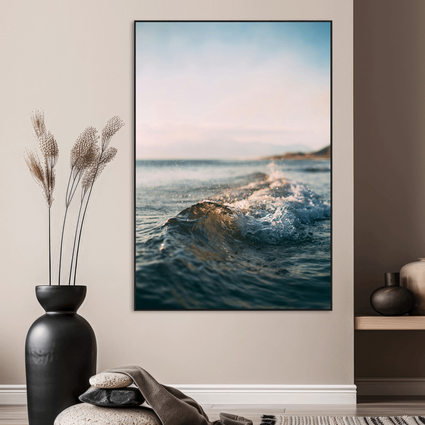 Close-up of ocean waves rolling gently toward the shore at sunset, creating a peaceful and minimalist coastal scene.