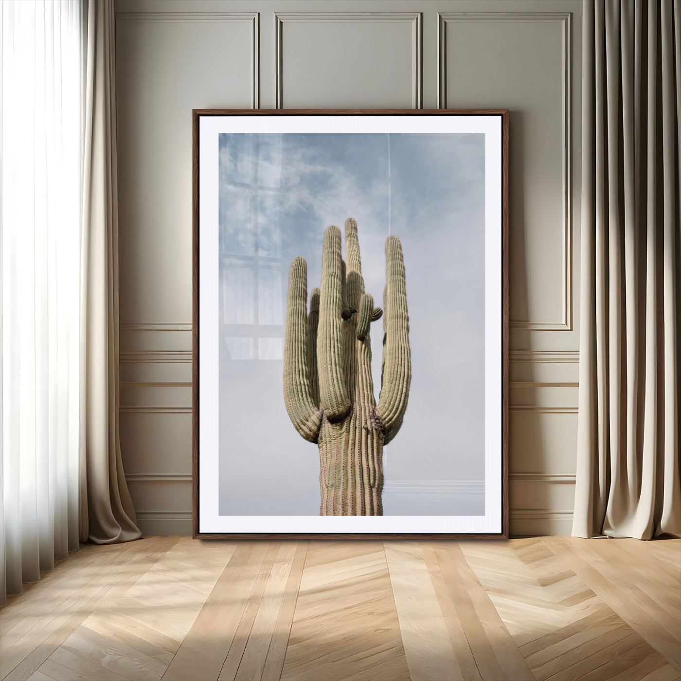 Vertical photo of a tall saguaro cactus against a soft sky, ideal for earthy or Southwestern home decor with warm neutral tones.