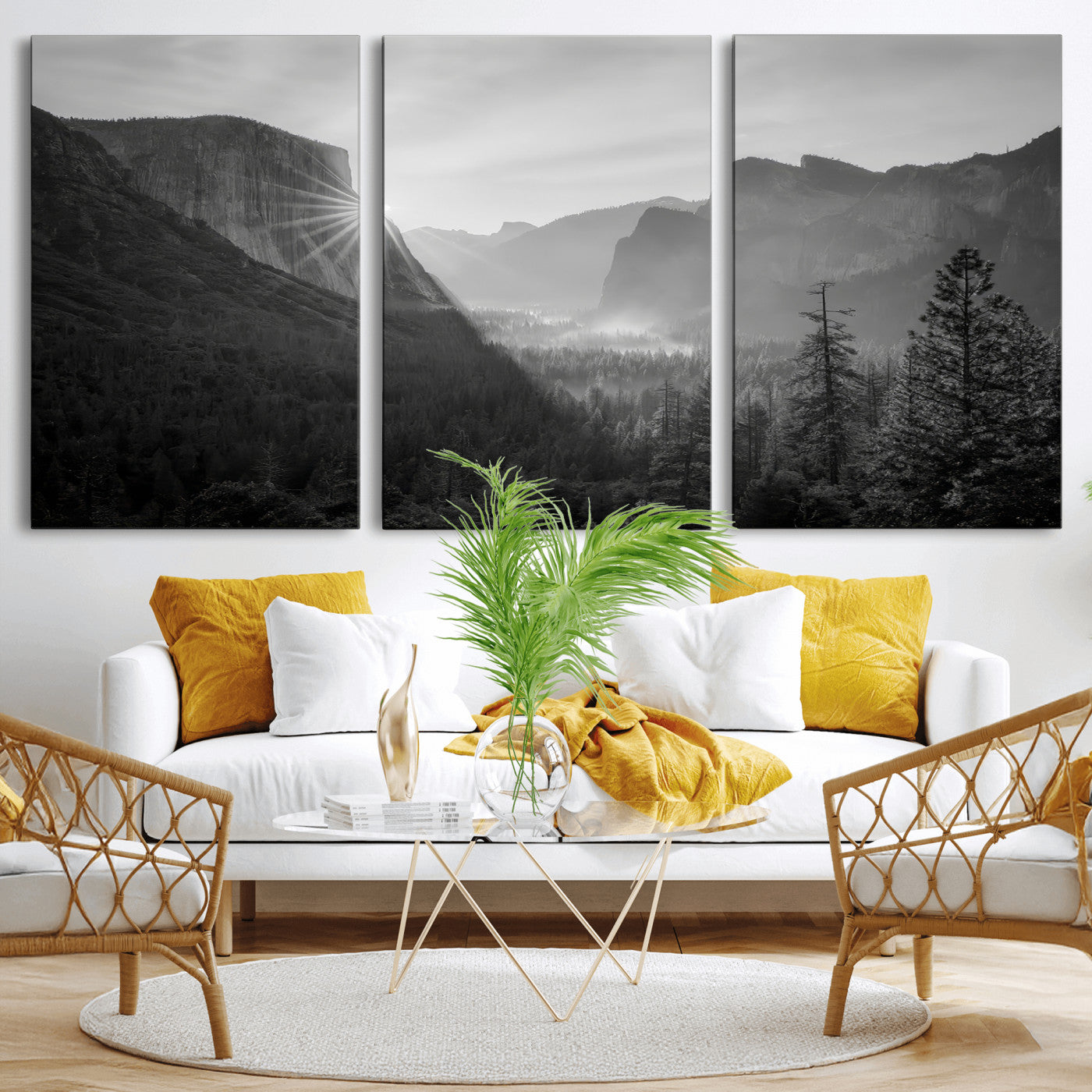 Black and white landscape of Yosemite with sun rays peeking over El Capitan, ideal for moody nature or modern rustic decor.
