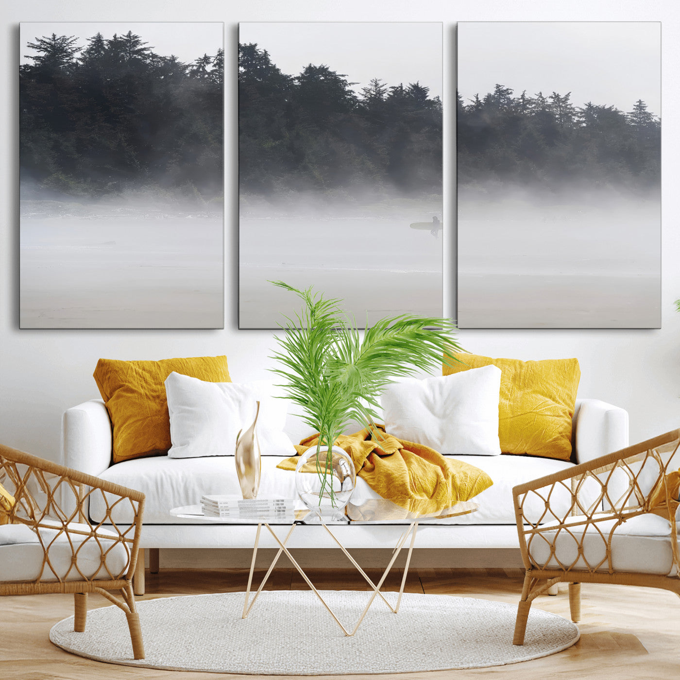 A lone surfer carrying a board through a misty shoreline, surrounded by dense trees and fog, creating a peaceful and mysterious coastal scene.