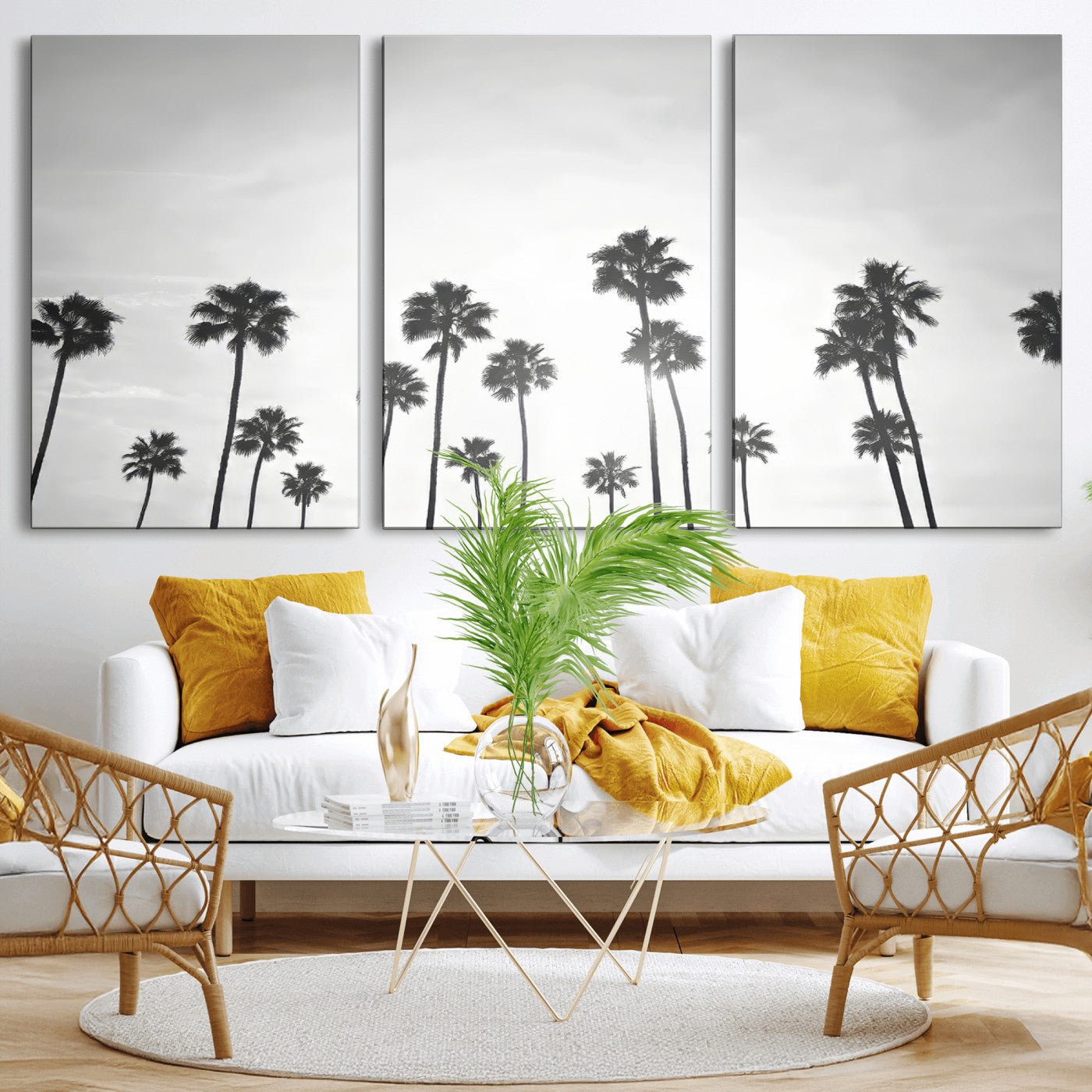 A black and white minimalist scene featuring tall palm trees silhouetted against a bright sky, creating a dreamy and timeless tropical aesthetic.
