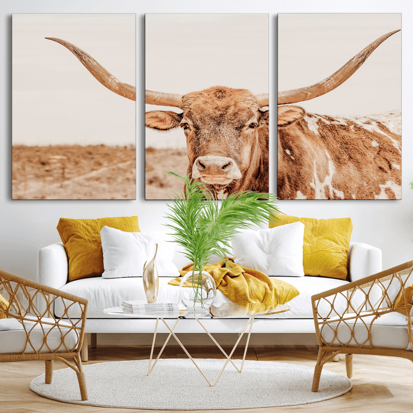 A longhorn bull standing proudly in a sunlit desert field with warm neutral tones, ideal for rustic western or farmhouse interiors.