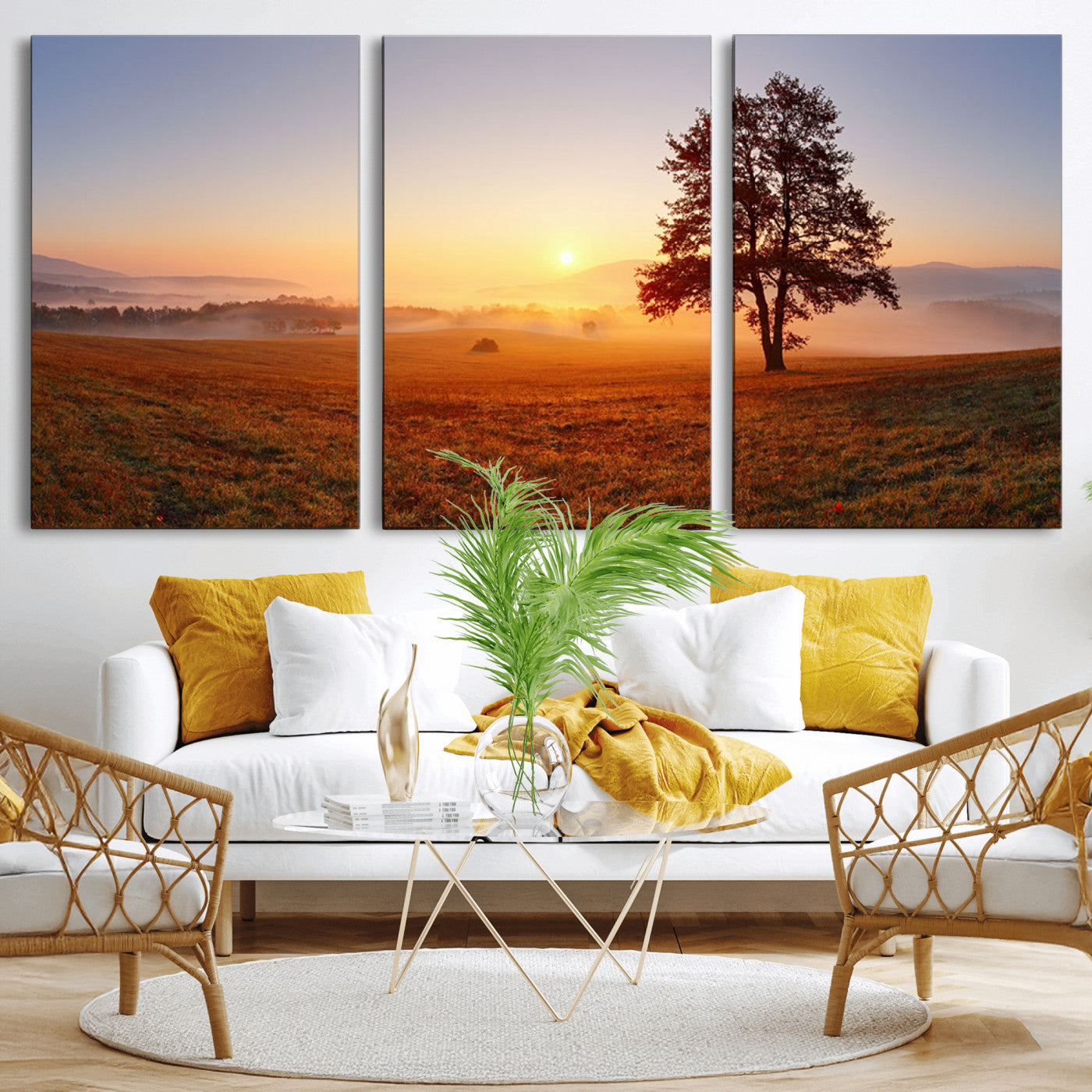 A tranquil landscape at sunrise with a mist-covered field and a lone tree, creating a peaceful and natural atmosphere.