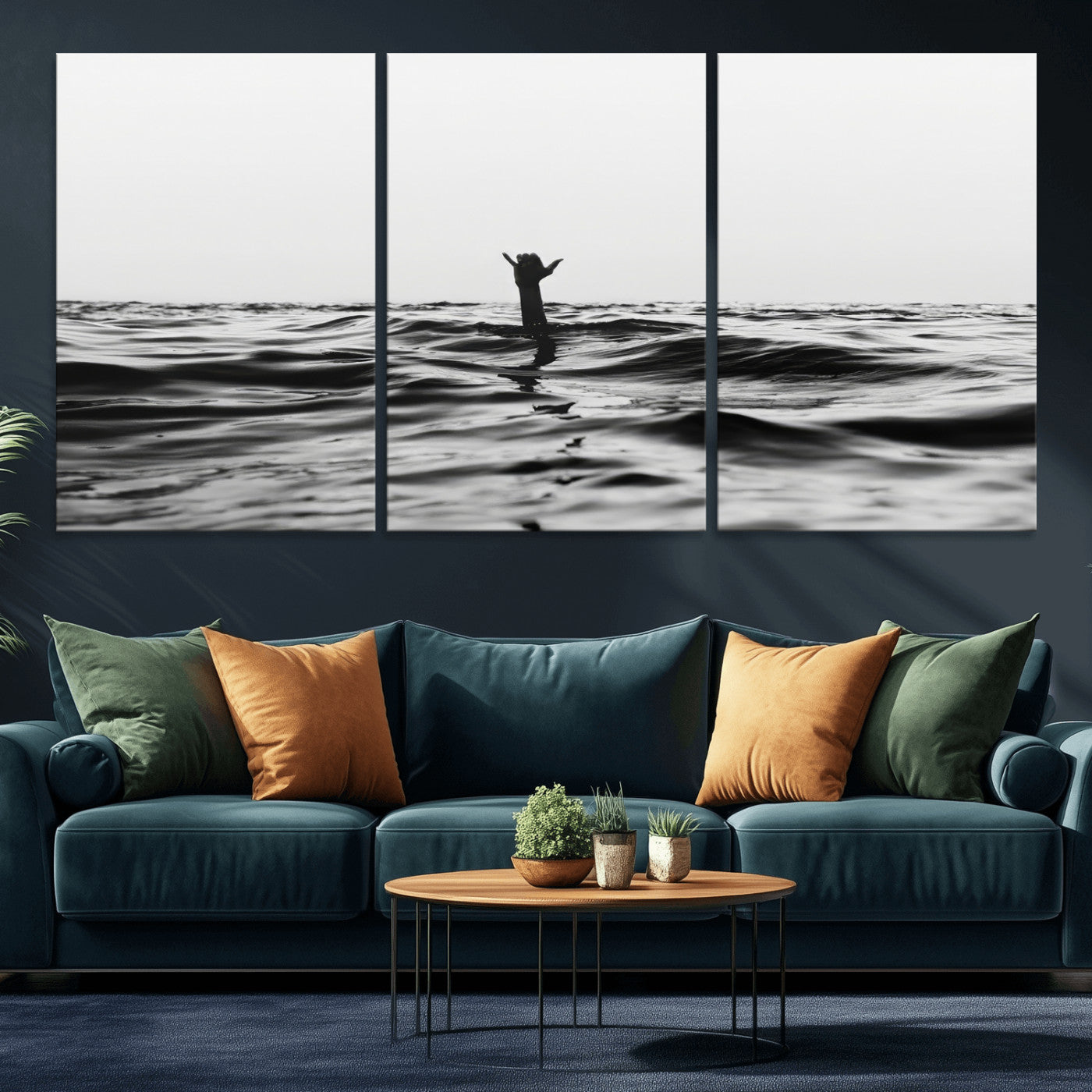 Black and white ocean with a hand making a surfer sign among dark waves, creating a dramatic and minimalist seascape with bold contrast.