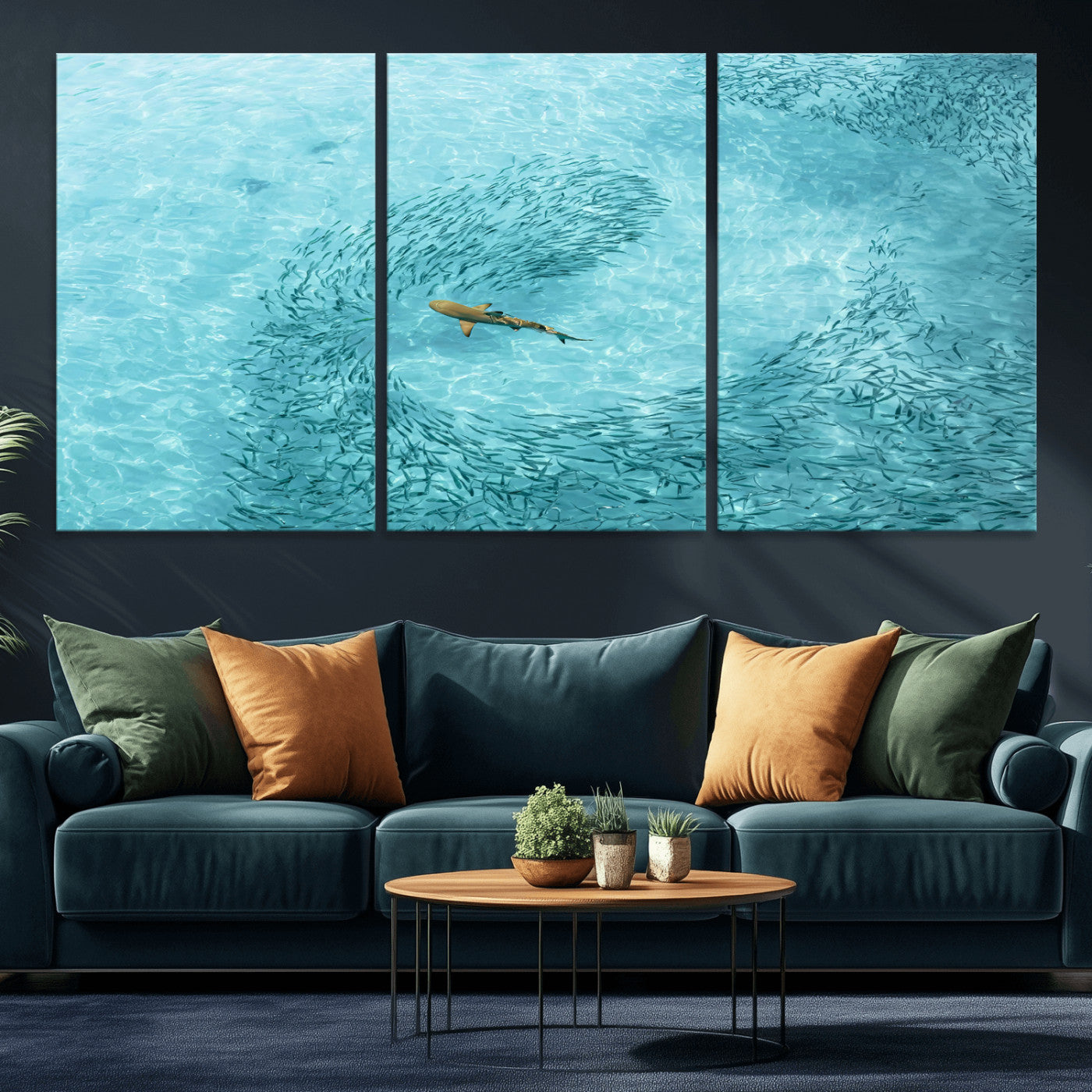 Aerial view of a shark swimming through a swirl of fish in clear turquoise waters, perfect for calm coastal or beach house decor.