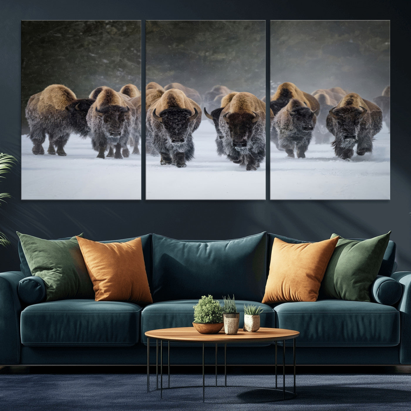 A herd of American bisons walking through deep snow in a forest, evoking a powerful rustic wilderness mood for western-style interiors.