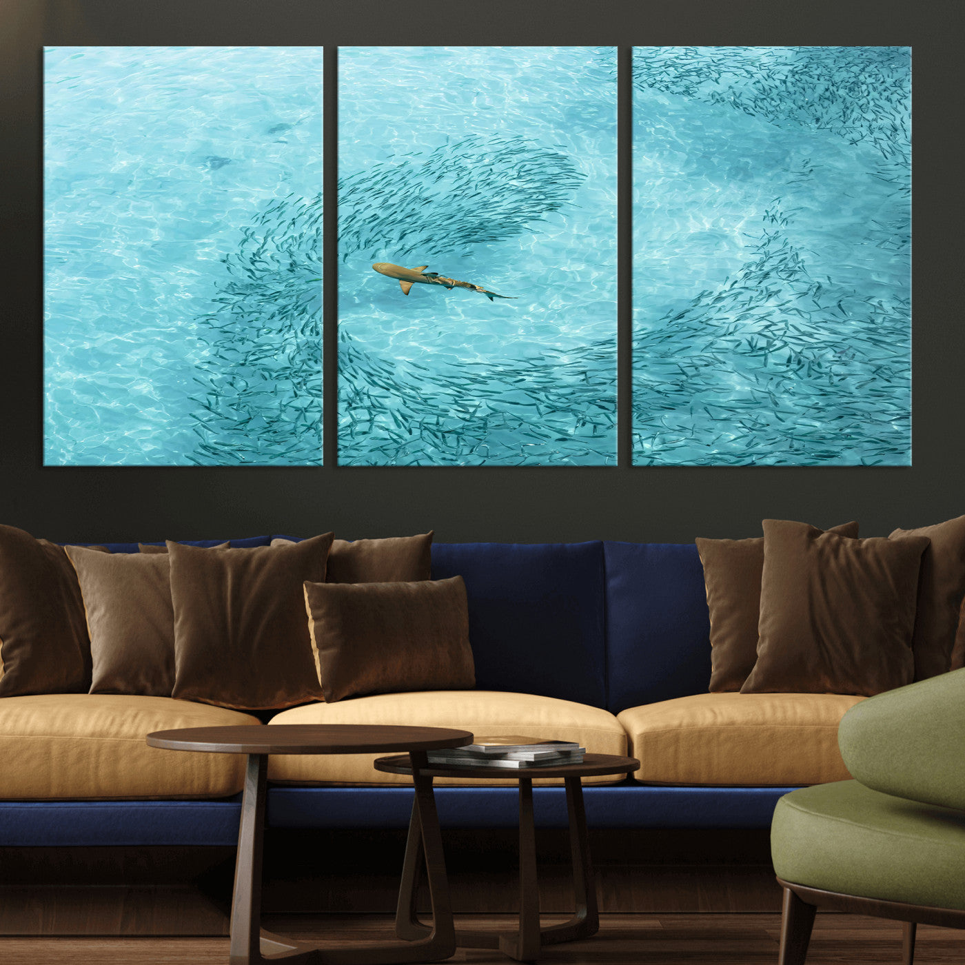 Aerial view of a shark swimming through a swirl of fish in clear turquoise waters, perfect for calm coastal or beach house decor.