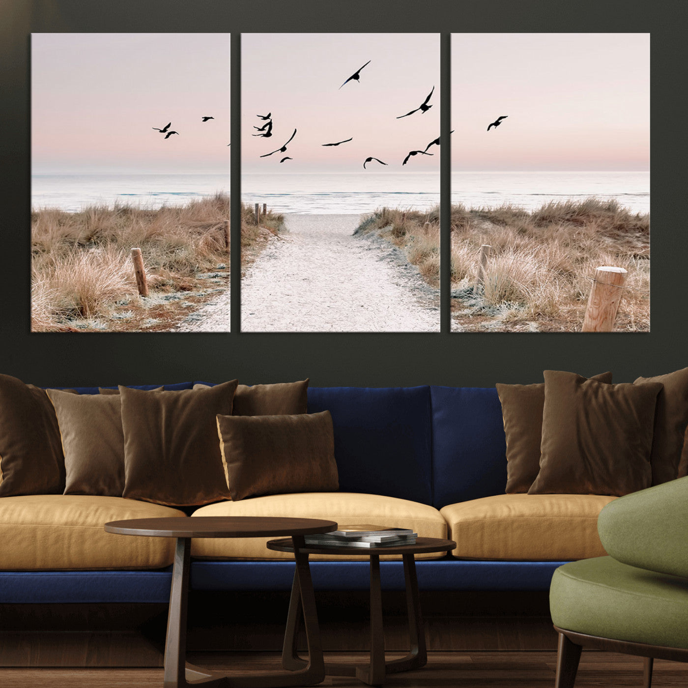 A peaceful coastal pathway leading to the ocean, with birds flying across a soft pastel sky, creating a calm and scenic beach atmosphere.