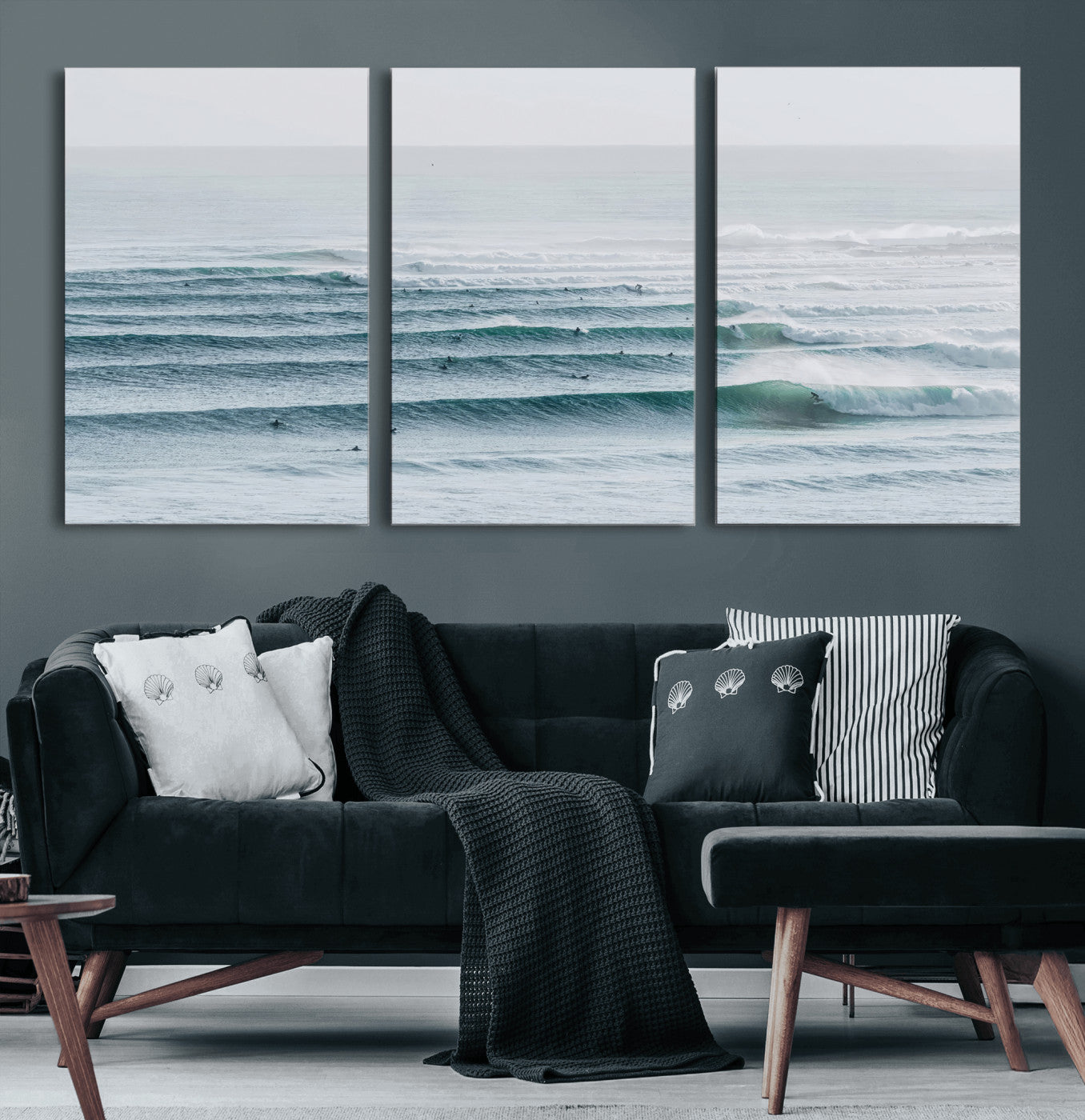 High-angle view of surfers lining up across layered ocean waves, ideal for minimal coastal or surf-inspired room decor.