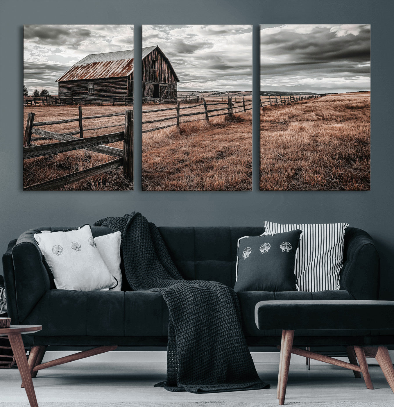 Framed canvas of a rustic barn under a moody sky with weathered fence and dark fields, ideal for farmhouse or rural-style wall decor.
