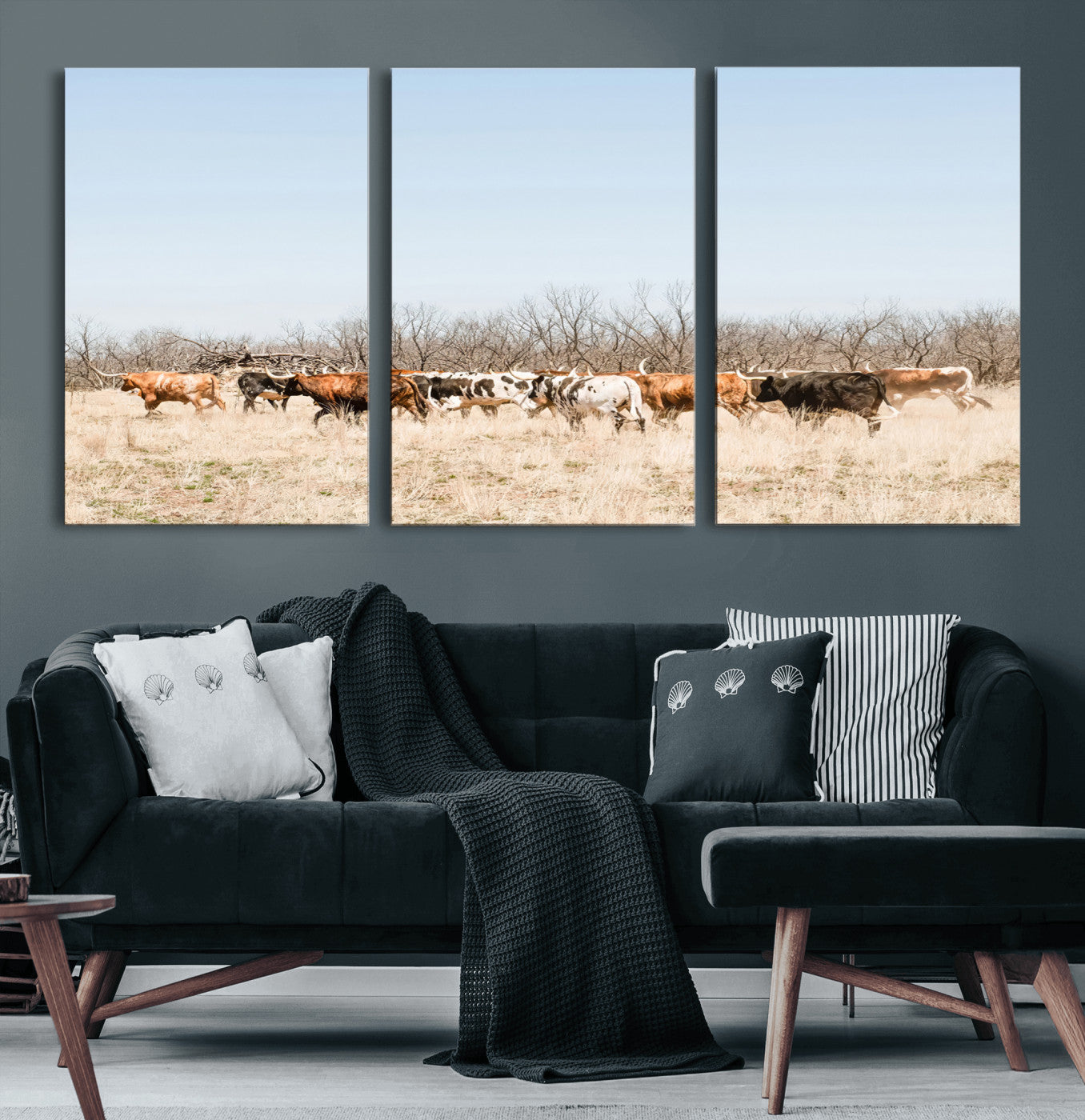 Framed wall art of Texas longhorn cattle walking through a dry, neutral-toned prairie, perfect for rustic farmhouse or western-themed home decor.