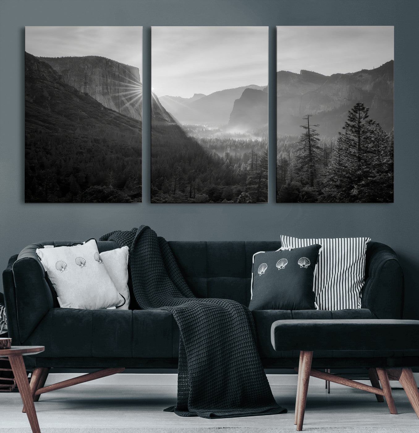 Black and white landscape of Yosemite with sun rays peeking over El Capitan, ideal for moody nature or modern rustic decor.