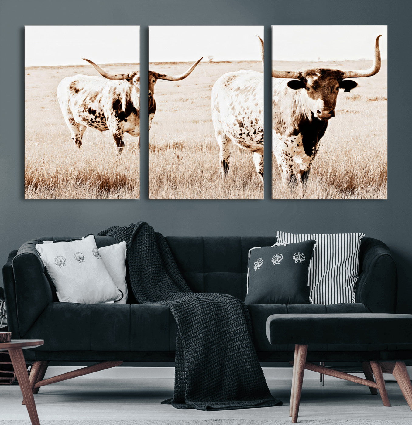 Two Texas longhorn cows standing in a sepia-toned pasture, evoking rustic charm perfect for farmhouse or western country interiors. (