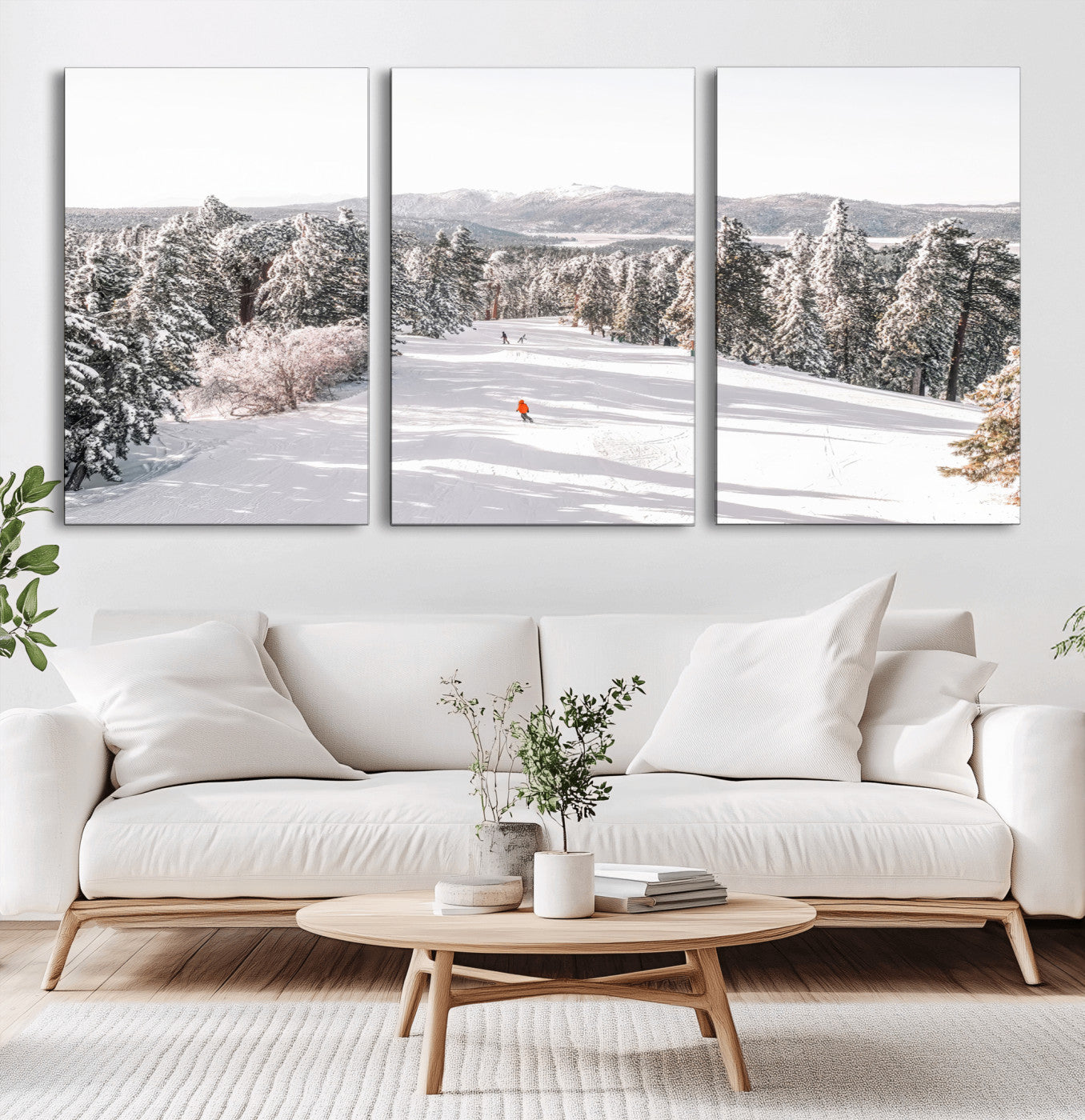 Bright ski trail lined with snow-covered pines and a skier in orange, perfect for alpine adventure or winter sports-inspired decor.