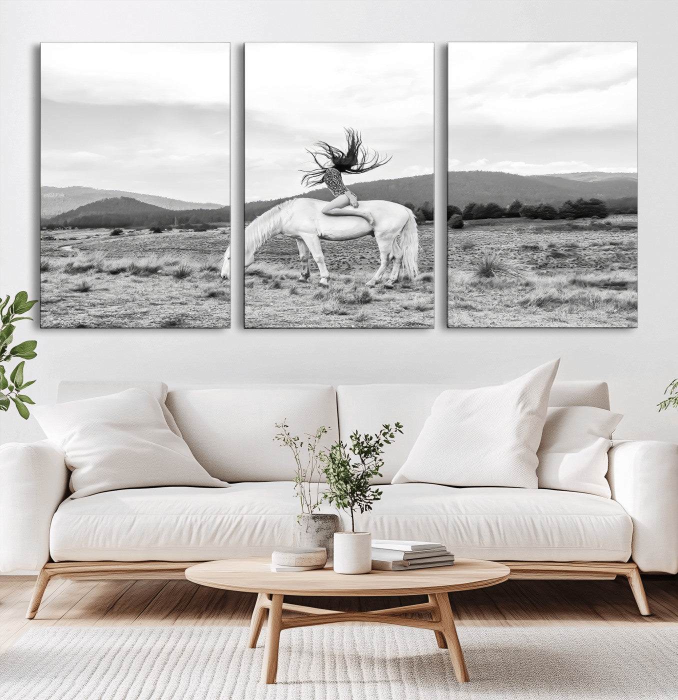 Black and white photo of a woman on a white horse in moody tones, ideal for Western Boho or modern rustic-style home decor.