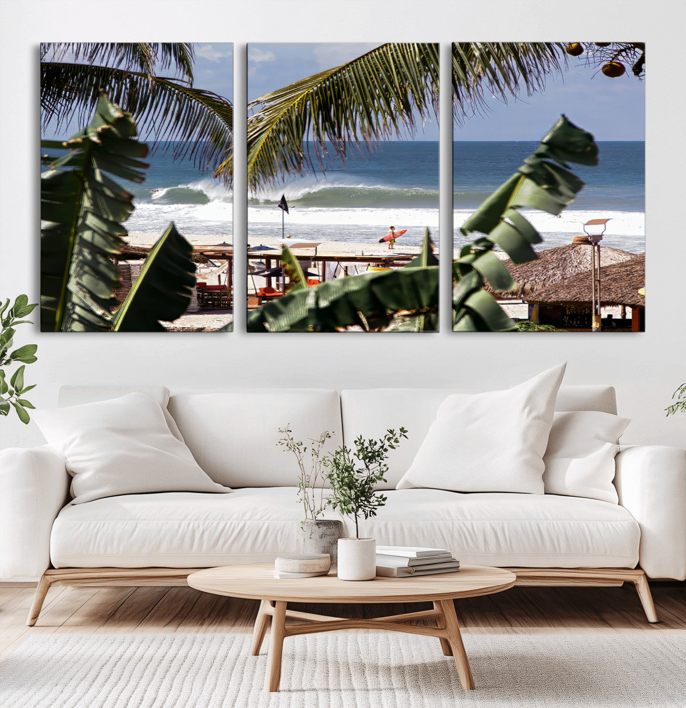 Canvas wall art of a tropical surf scene framed by palm trees, with a surfer on the shore and waves rolling in, ideal for beach-themed decor.