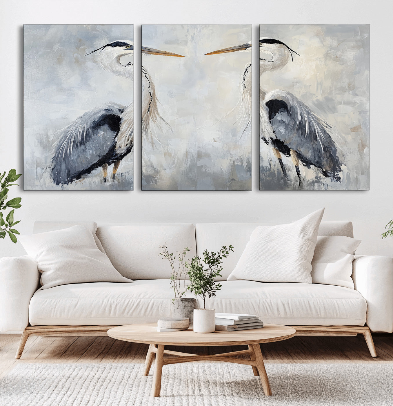 Two herons facing each other on a soft-toned background with blue-grey feathers, perfect for tranquil, coastal or nature-themed interiors.