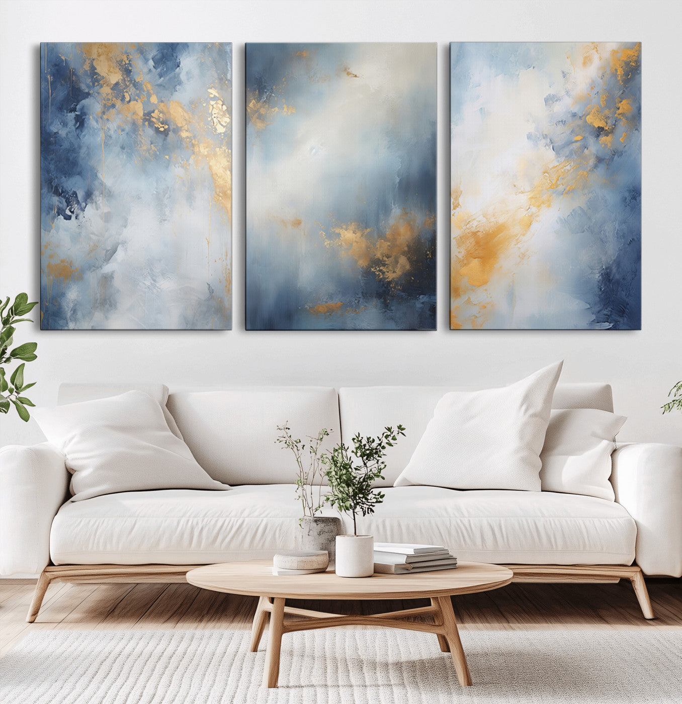 Abstract canvas art in soft blue and gold tones with textured brushstrokes, ideal for elegant or modern neutral decor spaces.