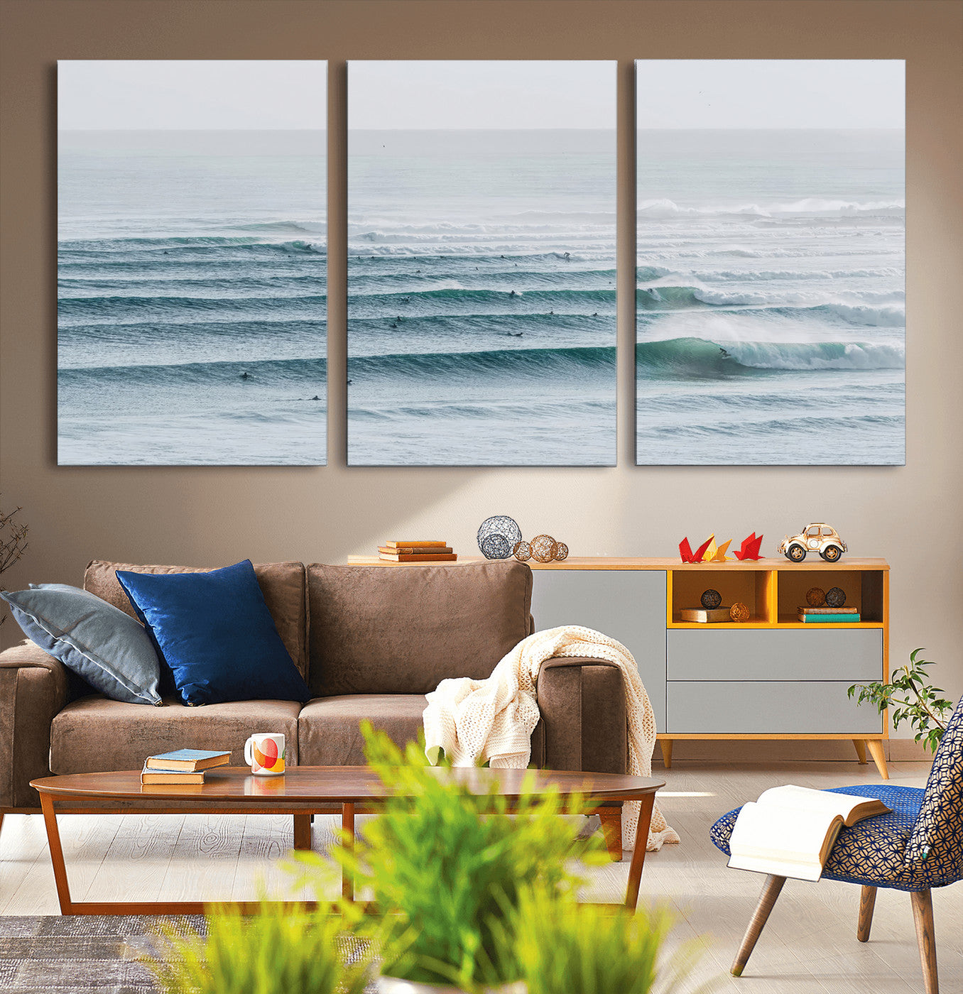 High-angle view of surfers lining up across layered ocean waves, ideal for minimal coastal or surf-inspired room decor.