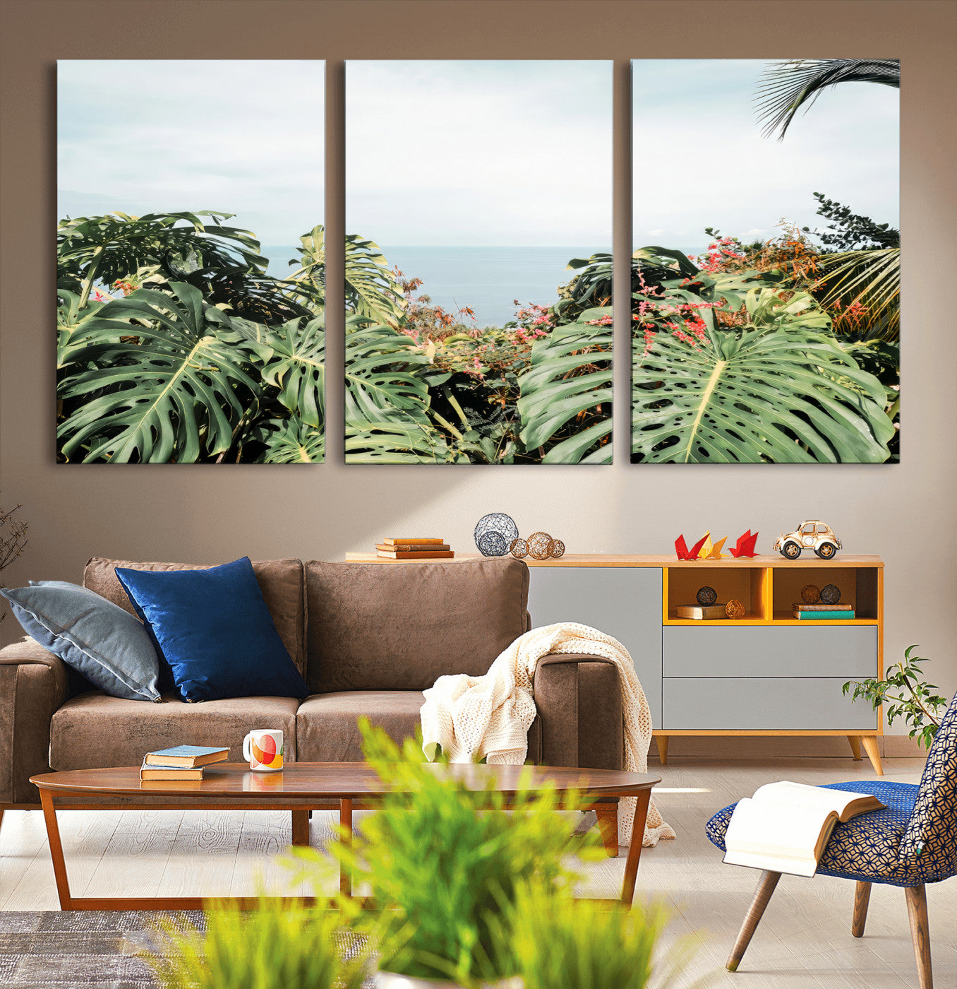 Monstera leaves and tropical flowers framing a calm ocean view, ideal for tropical coastal or exotic jungle-style interior wall decor.