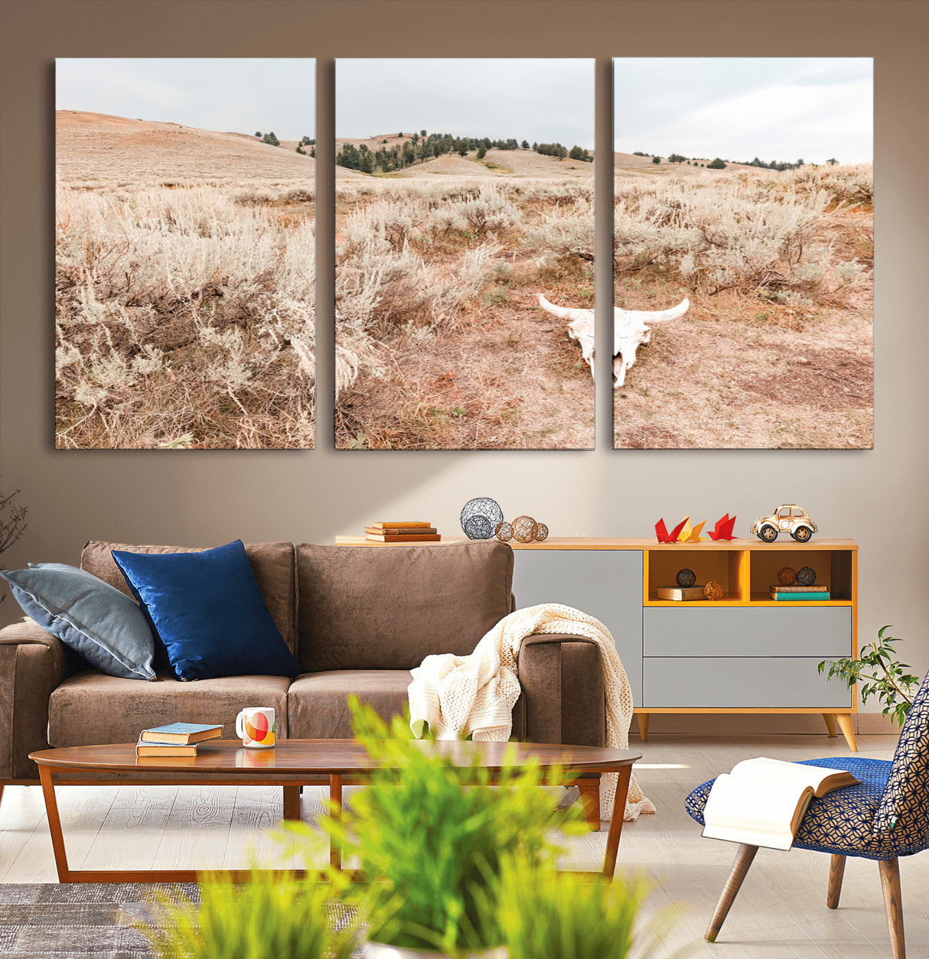 Rustic bull skull on dry sagebrush field under soft light, ideal for western minimal or desert prairie-style wall decoration.