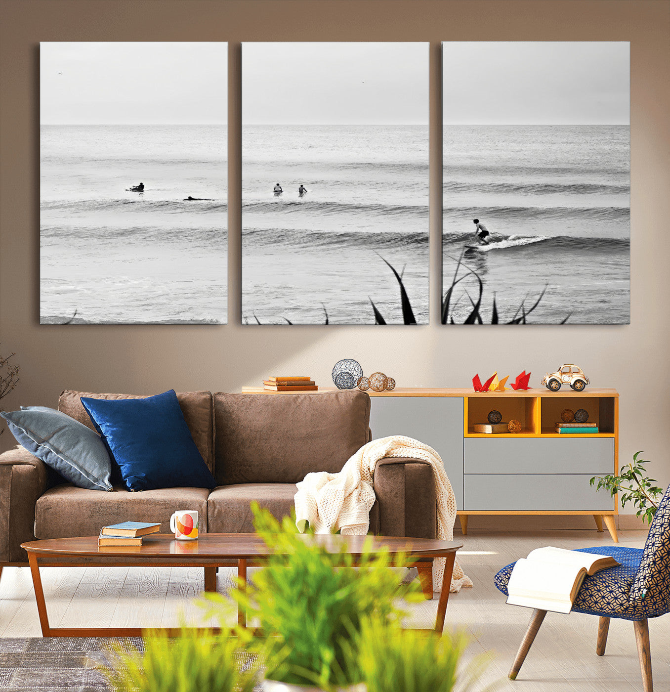 Monochrome canvas of surfers on calm ocean waves, ideal for minimalist coastal or beach-inspired interior decor.