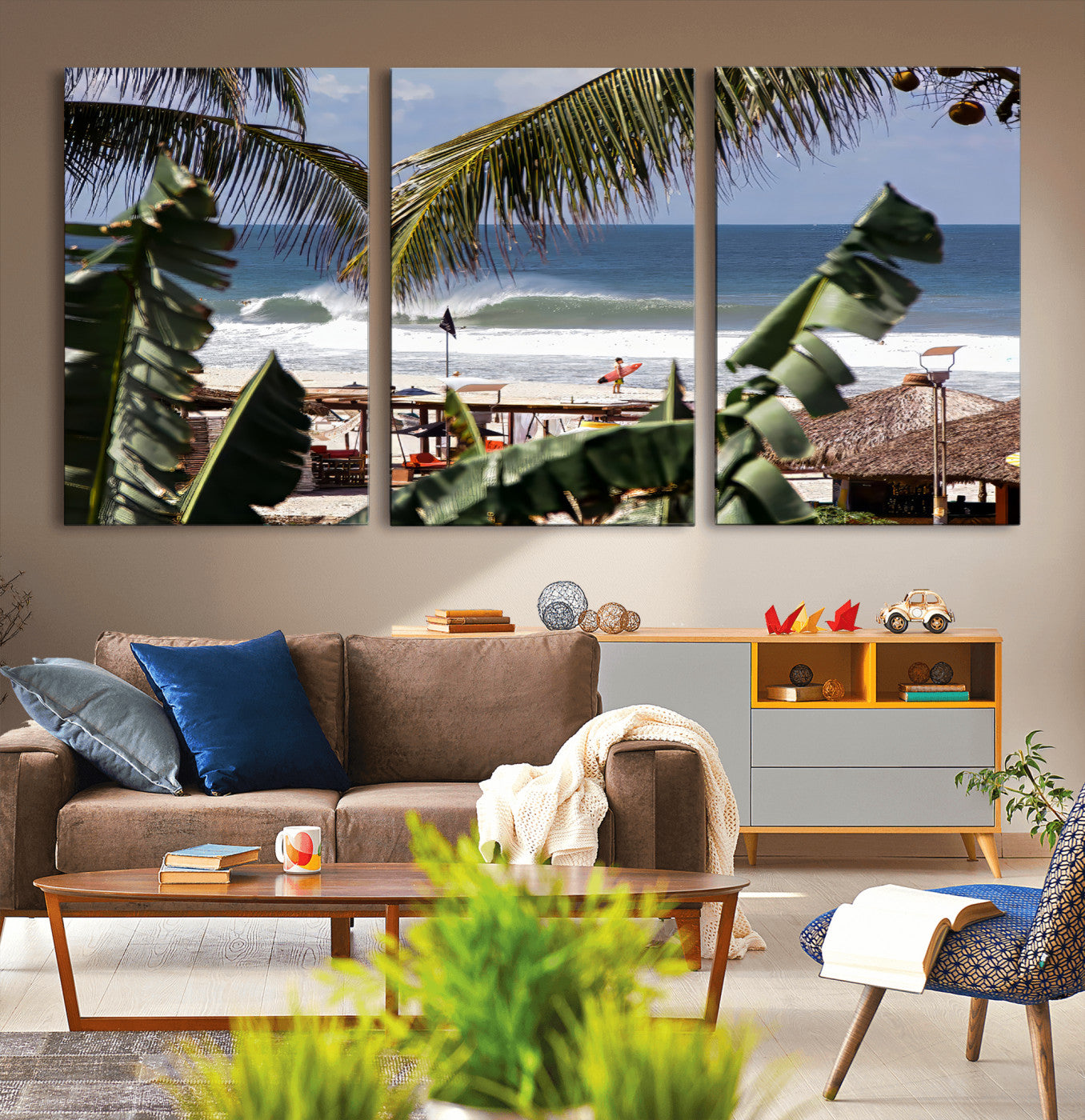 Canvas wall art of a tropical surf scene framed by palm trees, with a surfer on the shore and waves rolling in, ideal for beach-themed decor.