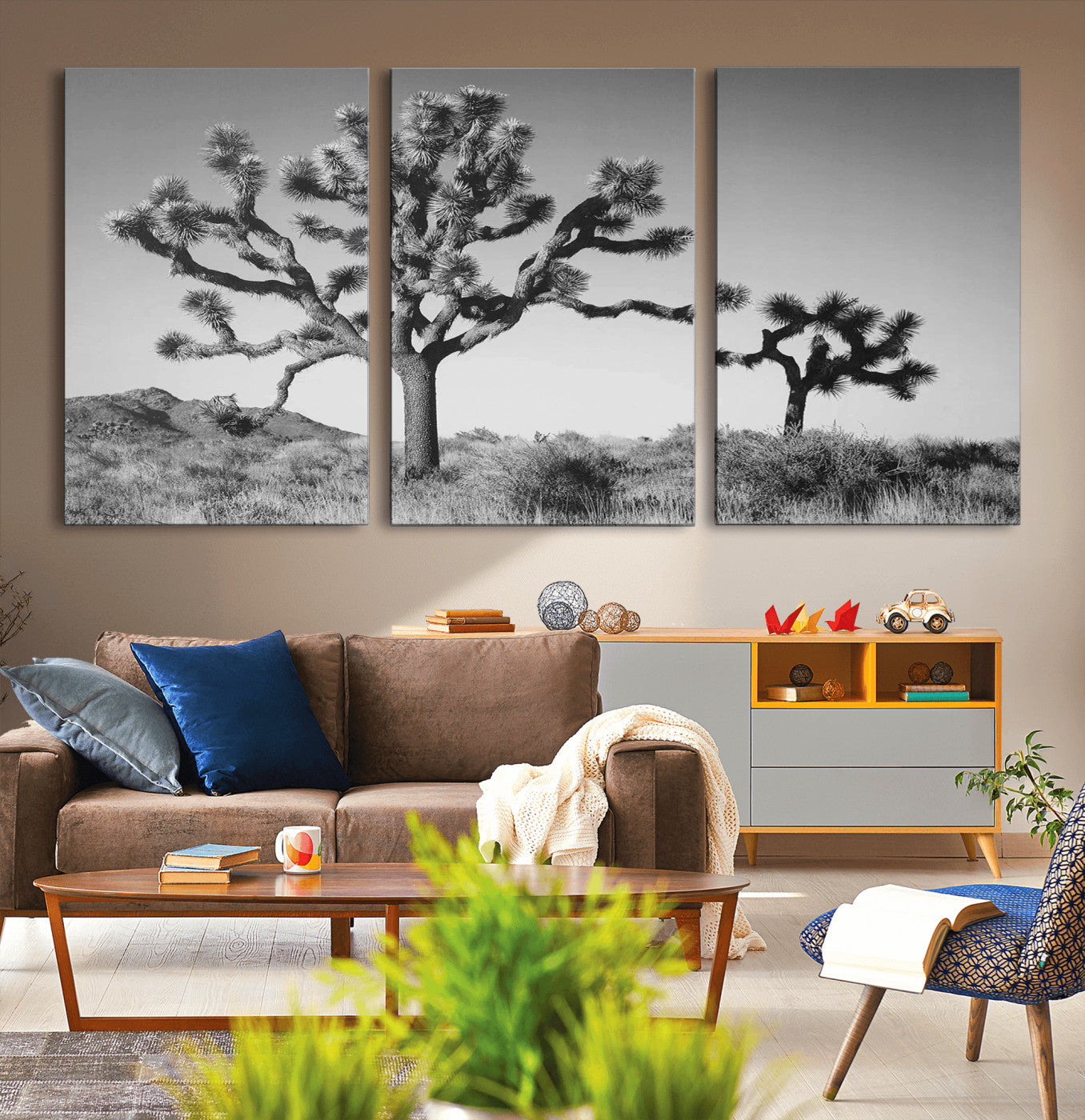 Black and white Joshua trees in a rugged desert landscape, creating a calm and minimalist feel for natural or rustic-themed interiors.
