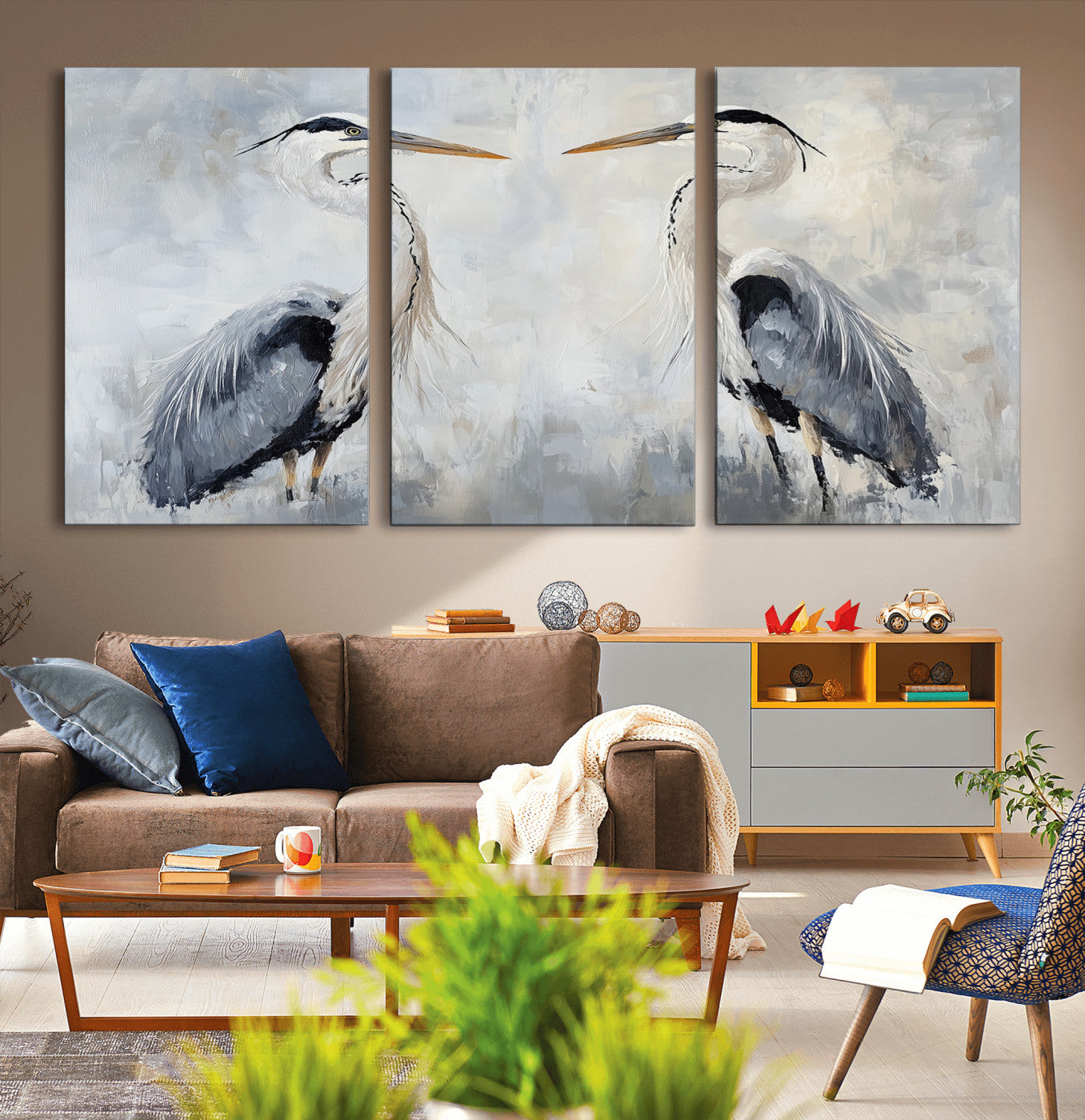 Two herons facing each other on a soft-toned background with blue-grey feathers, perfect for tranquil, coastal or nature-themed interiors.