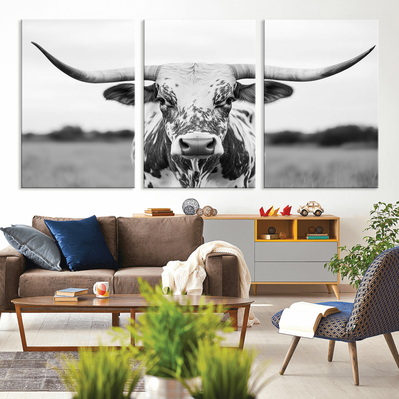 Capture the strength and elegance of nature with this striking black and white portrait of a longhorn cow. Its powerful presence makes a bold statement in any room.