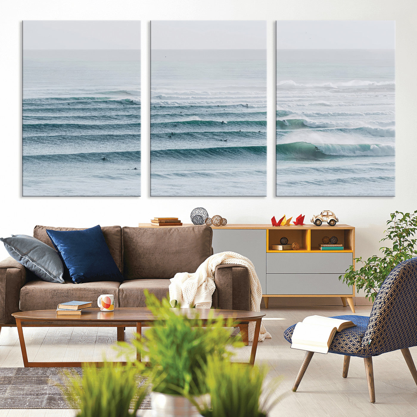 High-angle view of surfers lining up across layered ocean waves, ideal for minimal coastal or surf-inspired room decor.