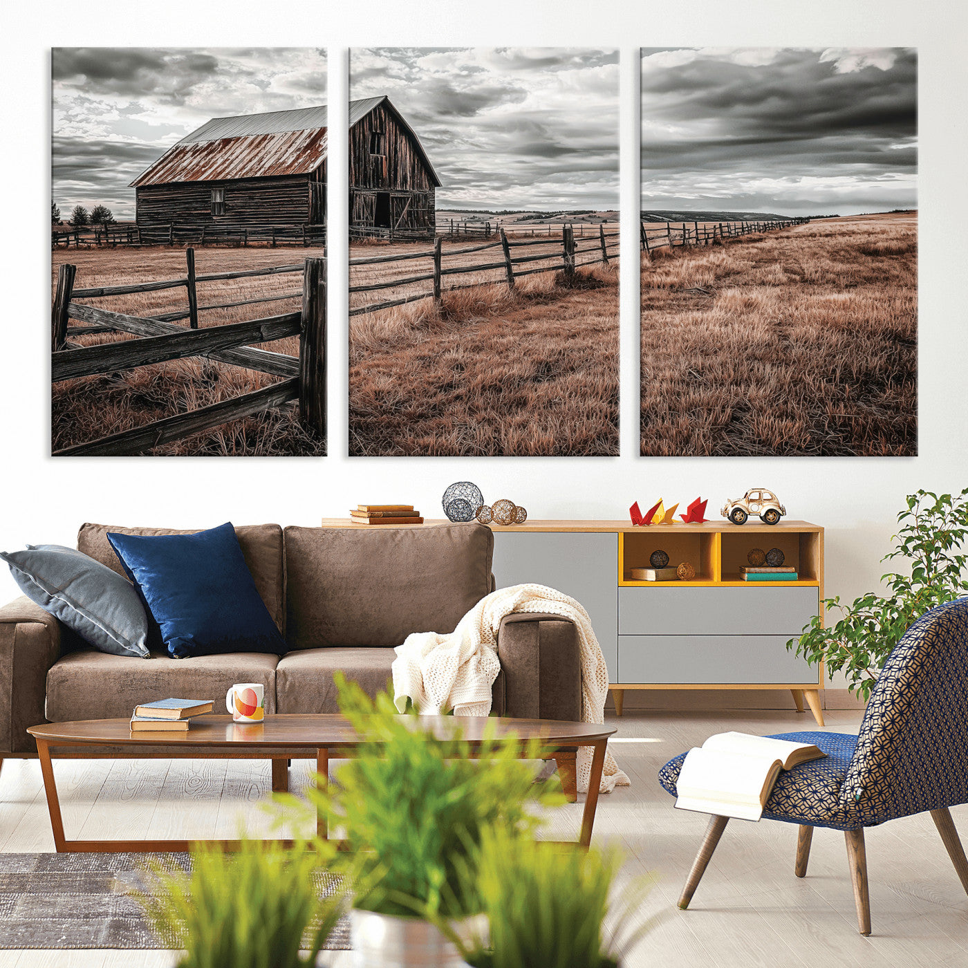 Framed canvas of a rustic barn under a moody sky with weathered fence and dark fields, ideal for farmhouse or rural-style wall decor.