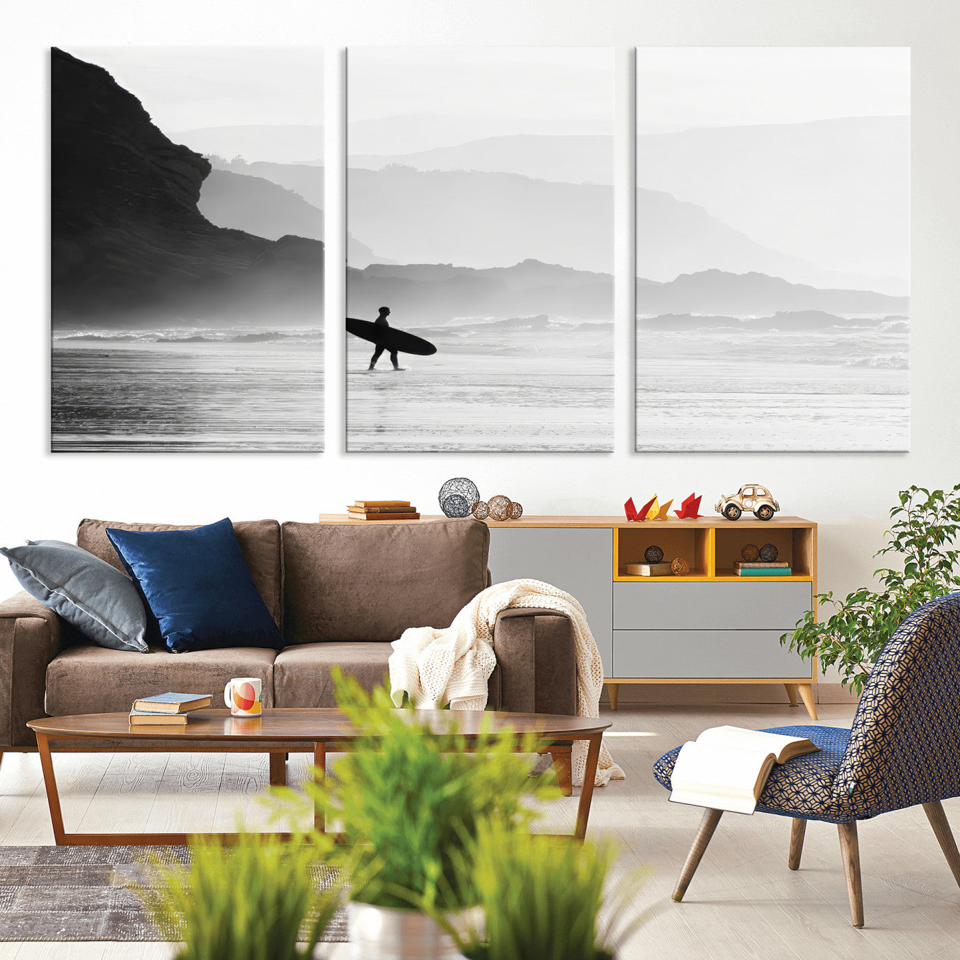 A lone surfer walking along a misty beach with cliffs in the background, carrying their board, capturing a serene and minimal ocean moment.