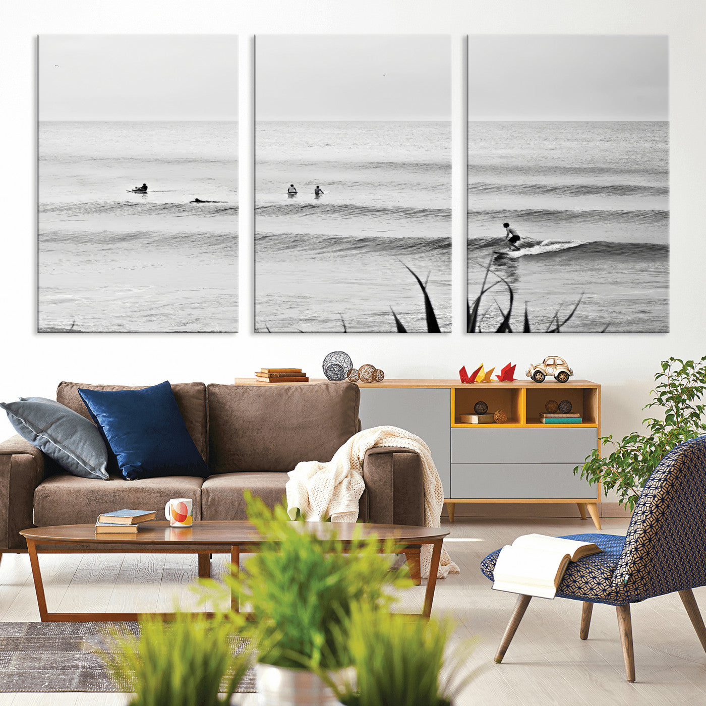 Monochrome canvas of surfers on calm ocean waves, ideal for minimalist coastal or beach-inspired interior decor.