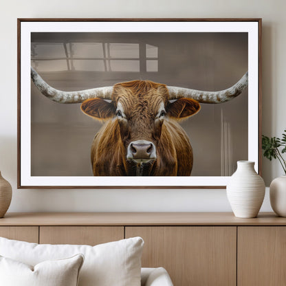 Close-up of a Texas Longhorn with strong curved horns and warm brown tones, perfect for rustic or western-style wall decor.