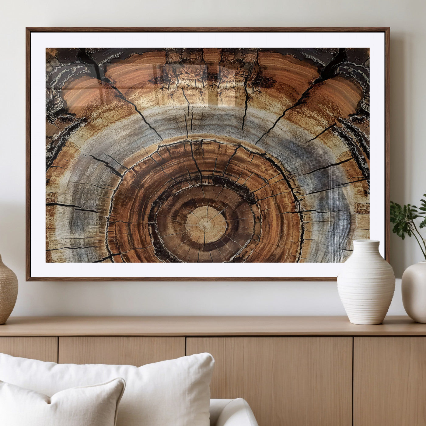 Canvas of tree rings and natural wood grain in earthy tones, ideal for rustic or vintage-inspired home decor with organic textures.