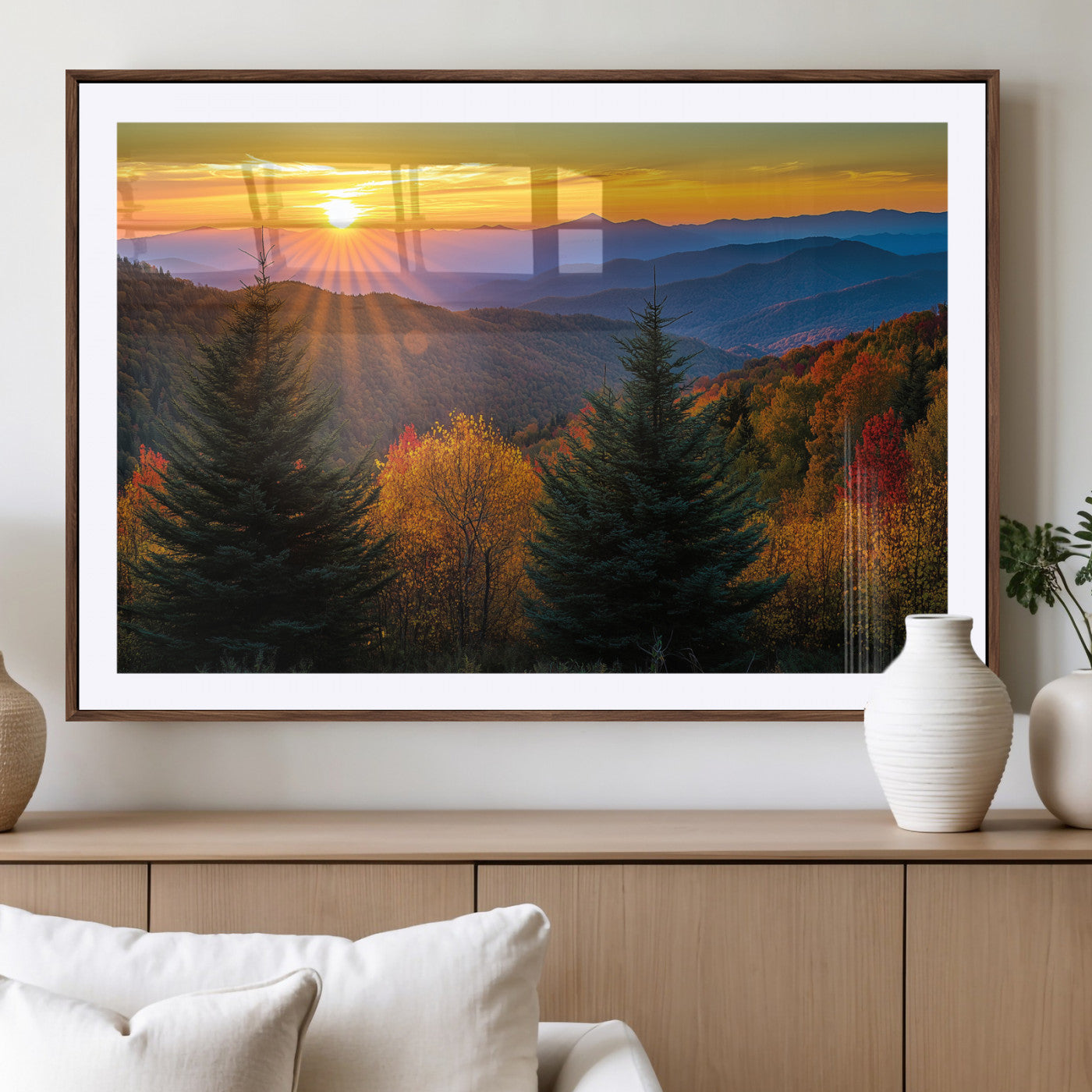 Vibrant sunset over autumn mountains with colorful trees and warm light, ideal for nature lovers or cabin-style wall decor.