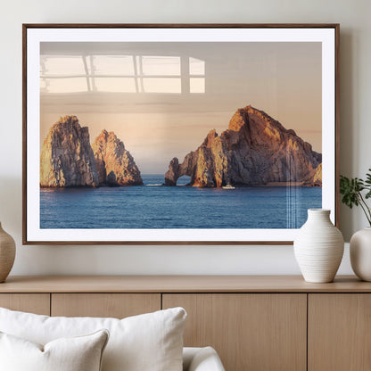 Framed canvas of El Arco rock formation in Cabo San Lucas at golden hour, ideal for coastal landmark or ocean-inspired decor.