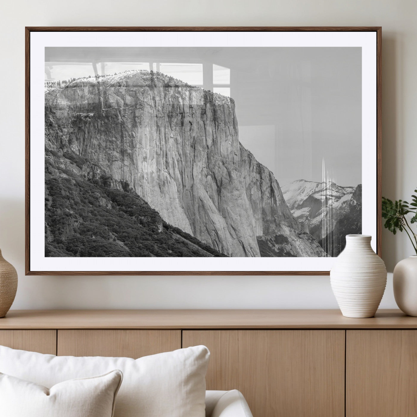Monochrome canvas of El Capitan’s granite wall in Yosemite with snowy peaks, ideal for dramatic mountain or black-and-white nature decor.