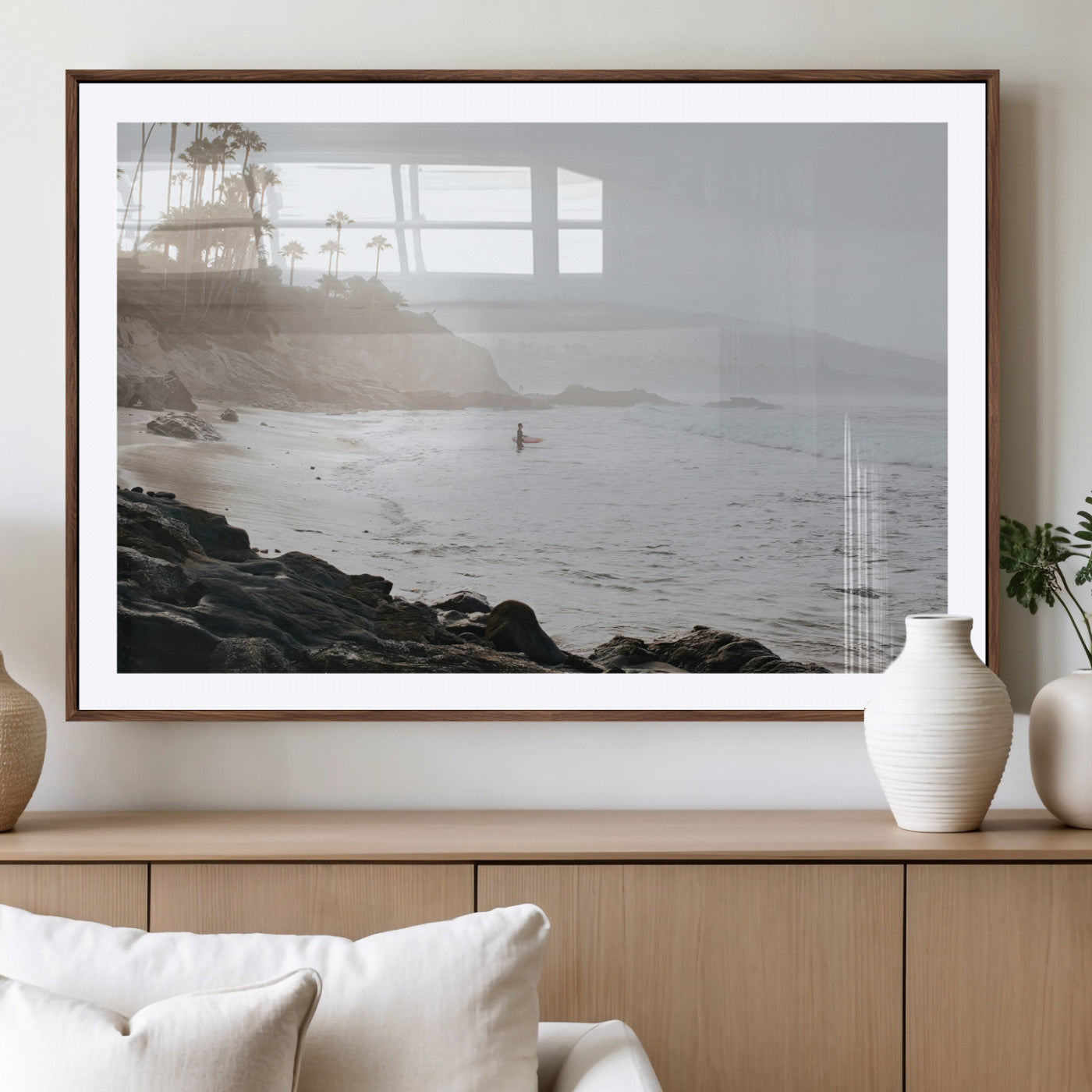 Framed canvas of a surfer in misty coastal tones at a foggy California beach, ideal for minimalist coastal beach or serene ocean-themed decor.