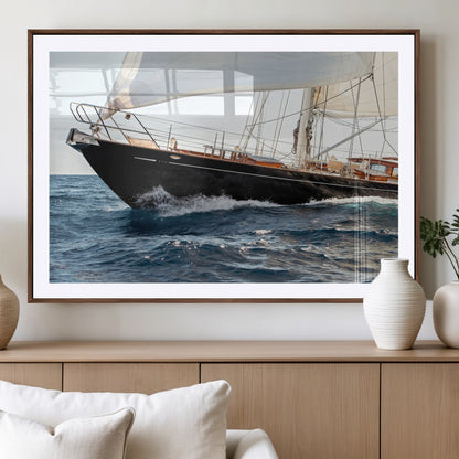 Close-up of a classic sailing yacht with wooden deck and full sails, perfect for nautical or coastal-style decor in ocean-themed spaces.