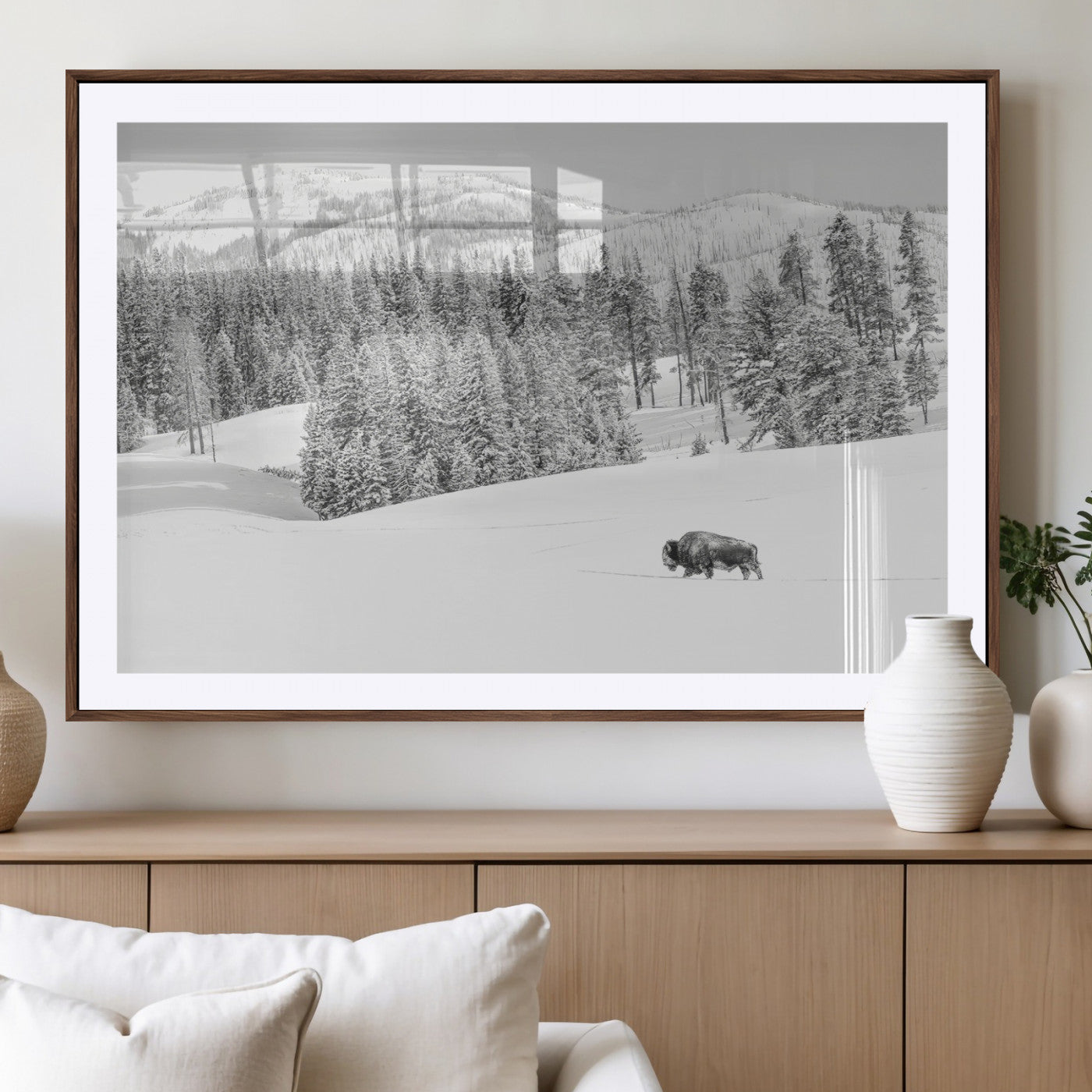 Snowy bison walking through white forest landscape, ideal for monochrome winter or wilderness-style interior wall decoration.