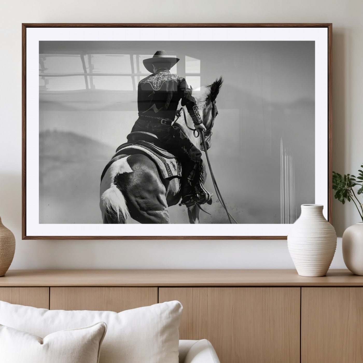 Black and white canvas of a cowboy on horseback with moody tones, perfect for rustic western or country-inspired home decor.