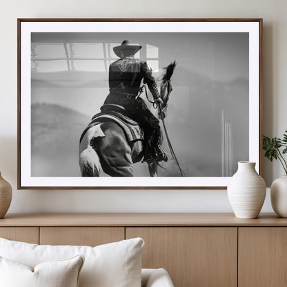 Black and white canvas of a cowboy on horseback with moody tones, perfect for rustic western or country-inspired home decor.